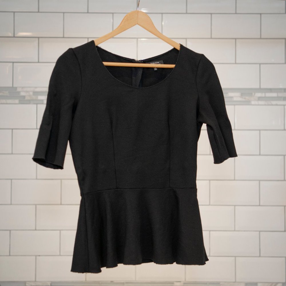 Black flare hip back zip Babaton top sz 4